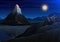 Mountain matterhorn, Night panoramic view of peaks with waterfall, landscape early in a daylight. travel or camping