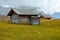 Mountain meadow and houses in Gardena valley and Seceda peak , background Alpe di Siusi or Seiser Alm in the with Province of