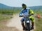 Mountain motocross race on dirt track in day time. Action sport