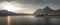 Mountain panorama at Lake Iseo with mountains and village Marone from above during sunset, Italy