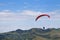 Mountain parasailing, Skydiving flying over the mountains. parachute extreme sport
