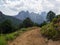 Mountain path with the Aiguilles de Bavella in the background