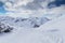 Mountain path in the Austrian alps covered in thick snow.