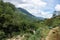 Mountain path with a bench. Mountain landscape