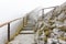 Mountain path stairs of pilatus in the morning fog