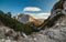 Mountain path and view on the peaks at sunset. Landscape