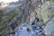 Mountain pathway secured with chain near Rysy peak, High Tatras