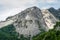 Mountain peak in the Apuan Alps, Italy, showing marble quarries at base. Enironmental damage.