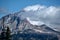 Mountain peak and clouds.