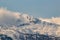 Mountain peak covered in early mist