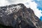 Mountain peak is covered with snow at summer