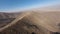 Mountain peak desert picturesque snowy summit sunny wild geology formation aerial view