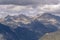 Mountain peak of the Pyrenees mountain range in Spain, with clouds in the sky