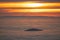 A mountain peak rises out of the sea of fog in the Black Forest like a whale\\\'s hump out of the ocean