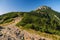 Mountain peak with rocky walls