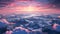 Mountain peaks with snow peaks with pink clouds at sunset view