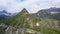 Mountain peaks in spring with remnants of snow in the background