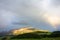 Mountain with rainbow