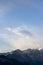 Mountain range around the Schwarzhanskarspitze mountain in vertical format in winter with gentle soft clouds