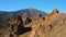 Mountain range in dry deserted landscape of Teide National Park. Scenery of highest volcano in Spain.