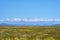 Mountain range landscape with meadow. Sunset view. Amazing natural background.