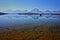 Mountain range reflection in lake in Grand Teton national park, US