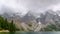 Mountain Range with Snow and Mist.