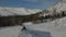 Mountain ranges covered with thick snow layer and forest