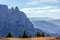 Mountain ranges of Seiser Alm and the mountain Punta Euringer covered with morning haze