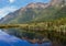 MOUNTAIN REFLECTION IN THE BANKS OF MIRROR LAKE