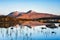 Mountain reflections on a calm lake in Glencoe, Scotland.