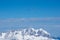 Mountain rescue helicopters above Alps, Kitzbuhel, Austria