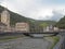 The mountain resort Rosa Khutor on the embankment of the river, the clock tower, bridge, hotels