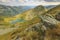 Mountain ridges and alpine lake,Capra lake,Fagaras mountains,Carpathians,Romania