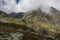 Mountain river canyon near Cascata delle Pisse waterfall in valley of Pisse, Alagna Valsesia area, Italy