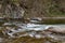 Mountain river in central europe. A fast stream high in the mountains