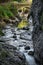 Mountain river in the gorge of mountains near the city of San Pelegrino in Italy