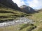 Mountain river making its way through the alpine scenery