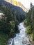 mountain river near houses in Dombay village