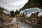 Mountain river Shumak with ice on the coastline