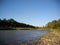 Mountain river with a stone shore