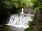 Mountain river stream. Waterfall.