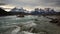 Mountain river at sunset with a view of the mountains. Torres del Paine, Chile