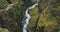 Mountain river and volcanic canyon near Glymur waterfall in Iceland