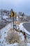 Mountain road with directional road signs day