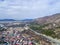 Mountain road from Gelendzhik to Novorossiysk. To the right are the Caucasus mountains, to the left are the houses of the city.