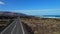 Mountain road lead along Atlantic Ocean. Lanzarote Island. Spain