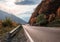 Mountain road and sky with sunbeams in Georgia