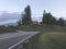 Mountain road and small house in Caucasus mountains. Sochi, Russia