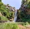 Mountain  Saar Falls with cold and crystal clear water descends from a crevice in the mountains of the Golan Heights in Israel